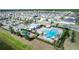 Community pool, playground, and clubhouse at 2037 Freemark St, Osteen, FL 32764