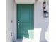 Modern teal front door with smart lock at 2037 Freemark St, Osteen, FL 32764