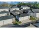 Aerial view of community with houses and garages at 210 Hammock Preserve Loop, Winter Garden, FL 34787