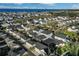 Aerial view of houses and waterfront community at 210 Hammock Preserve Loop, Winter Garden, FL 34787