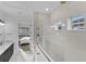 Spa-like bathroom with a large walk-in shower at 210 Hammock Preserve Loop, Winter Garden, FL 34787