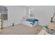 Charming bedroom with a twin bed and built-in storage at 210 Hammock Preserve Loop, Winter Garden, FL 34787