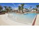 Resort-style pool with fountains and lounge chairs in a community setting at 210 Hammock Preserve Loop, Winter Garden, FL 34787