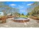 Brick seating area with benches and rocking chairs at 210 Hammock Preserve Loop, Winter Garden, FL 34787