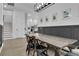 Dining room with a farmhouse table and view of kitchen at 210 Hammock Preserve Loop, Winter Garden, FL 34787