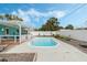 This in-ground pool has a surrounding concrete patio and is encased with a new fence, making it private at 213 Oakland Ave, Sanford, FL 32773