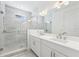 Elegant bathroom with double vanity, large shower, and modern fixtures at 2229 Valentine Aly, Orlando, FL 32804