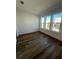 Bright bedroom with hardwood floors and three windows at 2229 Valentine Aly, Orlando, FL 32804