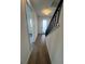 Bright entryway with wood-look floors and modern staircase at 2229 Valentine Aly, Orlando, FL 32804