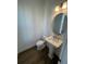 Stylish powder room with pedestal sink and modern fixtures at 2229 Valentine Aly, Orlando, FL 32804