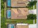 Bird's eye view of house with pool and surrounding homes at 2549 Archfeld Blvd, Kissimmee, FL 34747