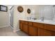 Double vanity bathroom with a large shower at 2549 Archfeld Blvd, Kissimmee, FL 34747