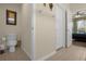 Bathroom with toilet and access to bedroom at 2549 Archfeld Blvd, Kissimmee, FL 34747