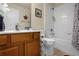 Clean bathroom with tub, toilet and vanity at 2549 Archfeld Blvd, Kissimmee, FL 34747