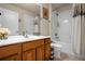 Clean bathroom with tub, shower, and double vanity at 2549 Archfeld Blvd, Kissimmee, FL 34747