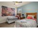 Bedroom with two twin beds and beach theme decor at 2549 Archfeld Blvd, Kissimmee, FL 34747