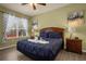 Bedroom with a king-size bed and view at 2549 Archfeld Blvd, Kissimmee, FL 34747