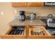 Kitchen drawers with organized silverware and utensils at 2549 Archfeld Blvd, Kissimmee, FL 34747