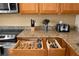 Granite kitchen countertops with organized drawers at 2549 Archfeld Blvd, Kissimmee, FL 34747