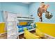 Fun ' bedroom with a bunk bed and colorful decor at 2610 Autumn Creek Cir, Kissimmee, FL 34747