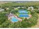 Community amenities including a pool, tennis, and basketball courts at 2764 Kingston Ridge Dr, Clermont, FL 34711