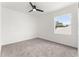 Bedroom with carpet, ceiling fan, and window with a view at 2764 Kingston Ridge Dr, Clermont, FL 34711