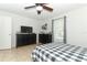 Bedroom featuring a black dresser and a flat-screen TV at 30 Old Barn Way, Casselberry, FL 32707