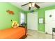 bedroom with green walls, featuring a twin bed at 30 Old Barn Way, Casselberry, FL 32707