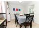 Dining room with gray tablecloth and black chairs at 30 Old Barn Way, Casselberry, FL 32707