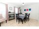 Bright dining room featuring a six-person table at 30 Old Barn Way, Casselberry, FL 32707