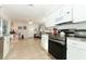 Modern kitchen with stainless steel appliances and granite countertops at 30 Old Barn Way, Casselberry, FL 32707