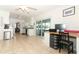 Kitchen with white cabinets, granite counters and stainless steel appliances at 30 Old Barn Way, Casselberry, FL 32707