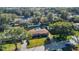 Aerial view of a ranch house with pool, showcasing the property's location and landscaping at 3020 Nancy St, Orlando, FL 32806