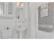 Clean bathroom with pedestal sink and shower/tub combo at 3020 Nancy St, Orlando, FL 32806