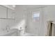 Bright bathroom with white tile and bathtub at 3020 Nancy St, Orlando, FL 32806