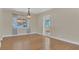 Hardwood floor dining room with chandelier and window at 3020 Nancy St, Orlando, FL 32806