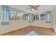 Bright sunroom with tile floors and multiple windows at 3020 Nancy St, Orlando, FL 32806