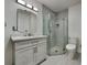 Modern bathroom with walk-in shower and vanity at 3342 Saint Vincent Ln, Clermont, FL 34711