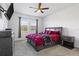 Spacious bedroom with a king-size bed and plenty of natural light at 3979 Ambrose Ave, Kissimmee, FL 34746