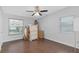 Spacious bedroom with hardwood floors and plenty of room at 402 Oak Lynn Dr, Orlando, FL 32809