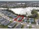 Aerial view of a single-Gathering house in a quiet residential neighborhood at 4530 Tahoe Cir, Clermont, FL 34714