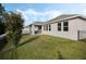 Spacious backyard with covered patio and fenced area at 4530 Tahoe Cir, Clermont, FL 34714