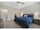 Spacious bedroom with a large bed, nightstand, and en-suite bathroom access at 4530 Tahoe Cir, Clermont, FL 34714