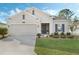 One story home with a two-car garage and nicely landscaped front yard at 4530 Tahoe Cir, Clermont, FL 34714