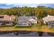 Aerial view of a home with pool and lakefront location at 4832 Shoreline Cir, Sanford, FL 32771