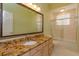 Bathroom with granite countertop and shower/tub combo at 4832 Shoreline Cir, Sanford, FL 32771