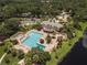 Resort-style pool with lap lanes, a spa, and lounge area at 4832 Shoreline Cir, Sanford, FL 32771