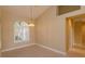 Formal dining room features high ceilings and a large window at 4832 Shoreline Cir, Sanford, FL 32771