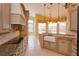 Kitchen with granite countertops, island, and white farmhouse sink at 4832 Shoreline Cir, Sanford, FL 32771