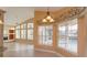 Breakfast nook in kitchen with view of the backyard pool at 4832 Shoreline Cir, Sanford, FL 32771